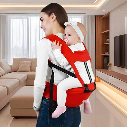 bebe au dos dans le porte bebe ergonomique